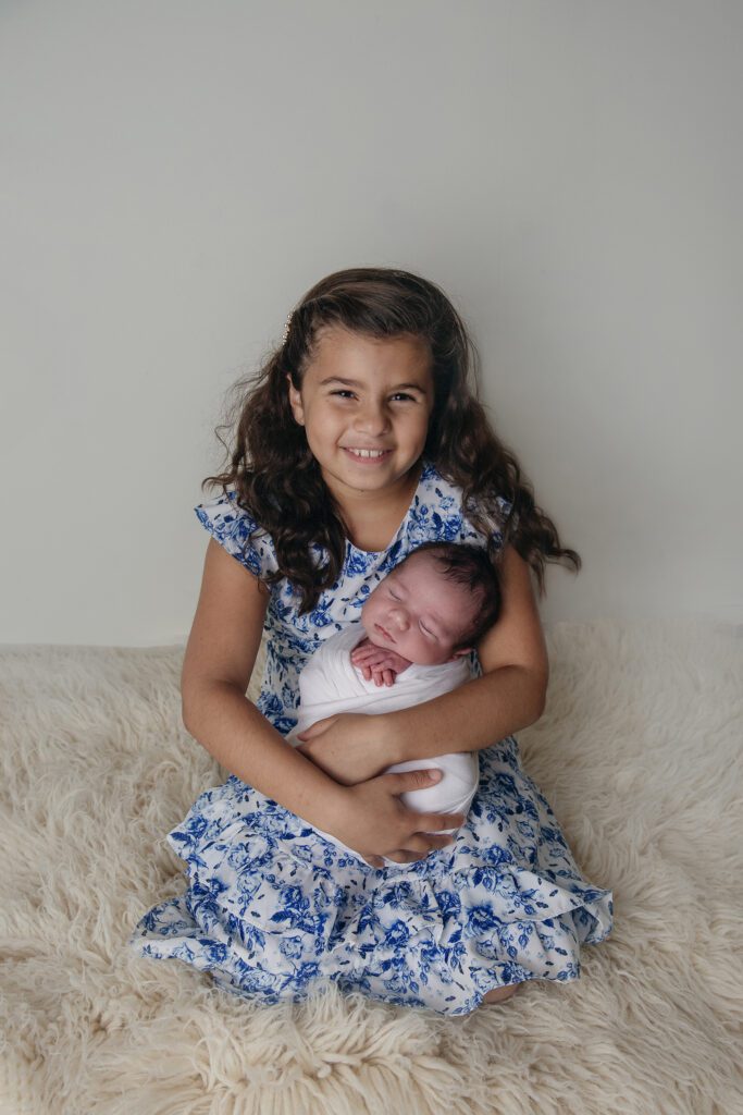 big sister and baby brother in Palatine studio | posed newborn session