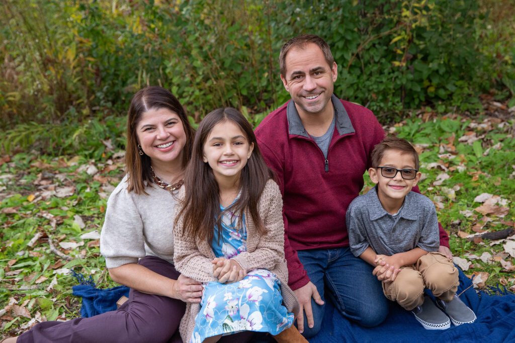 family posing for fall family mini sessions in Palatine, IL