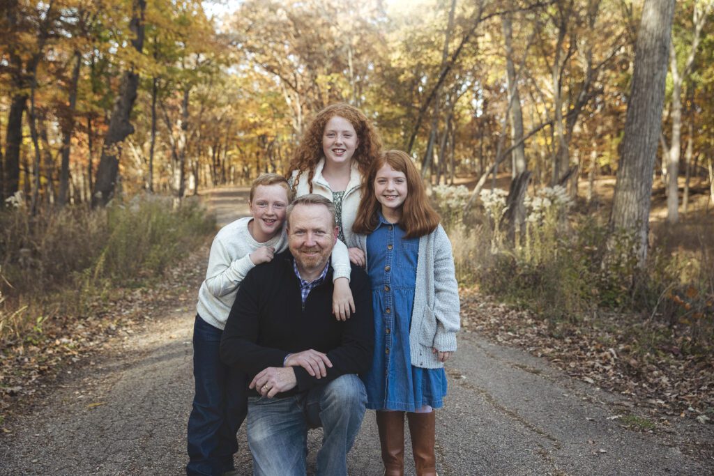 Dad and his kids in Palatine woods photograph taken by Just Peachy Photography