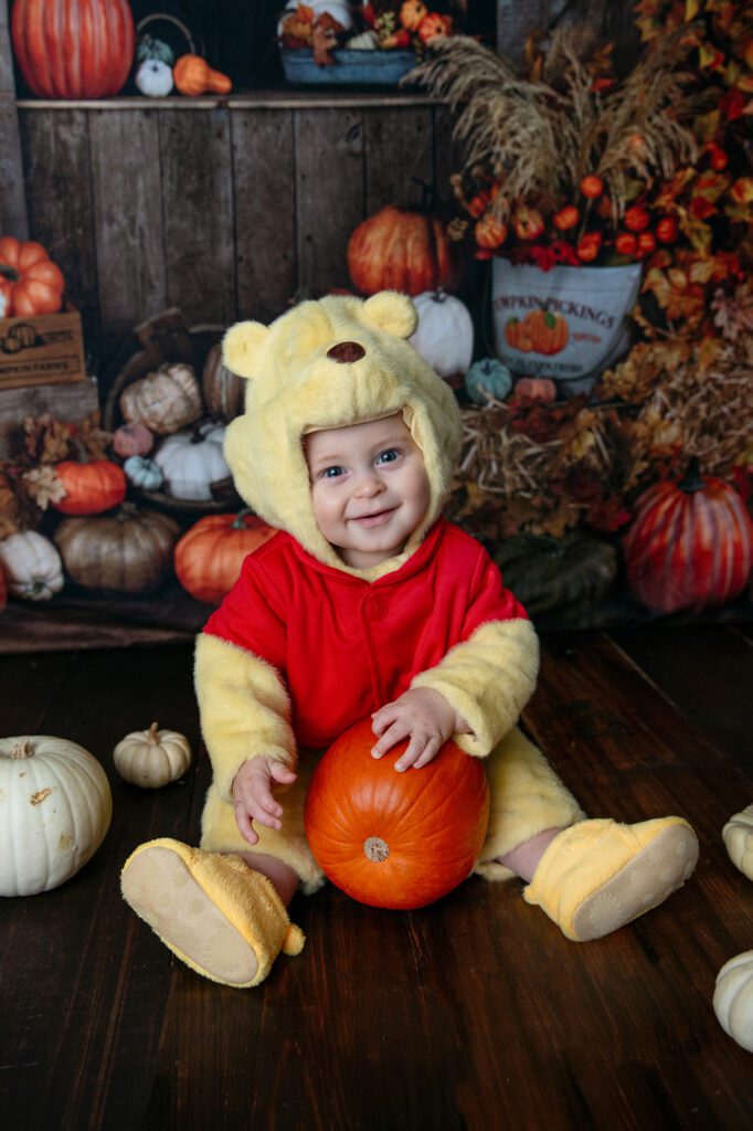 Winnie the Pooh baby costume at Palatine Halloween event at Just Peachy Photography studio