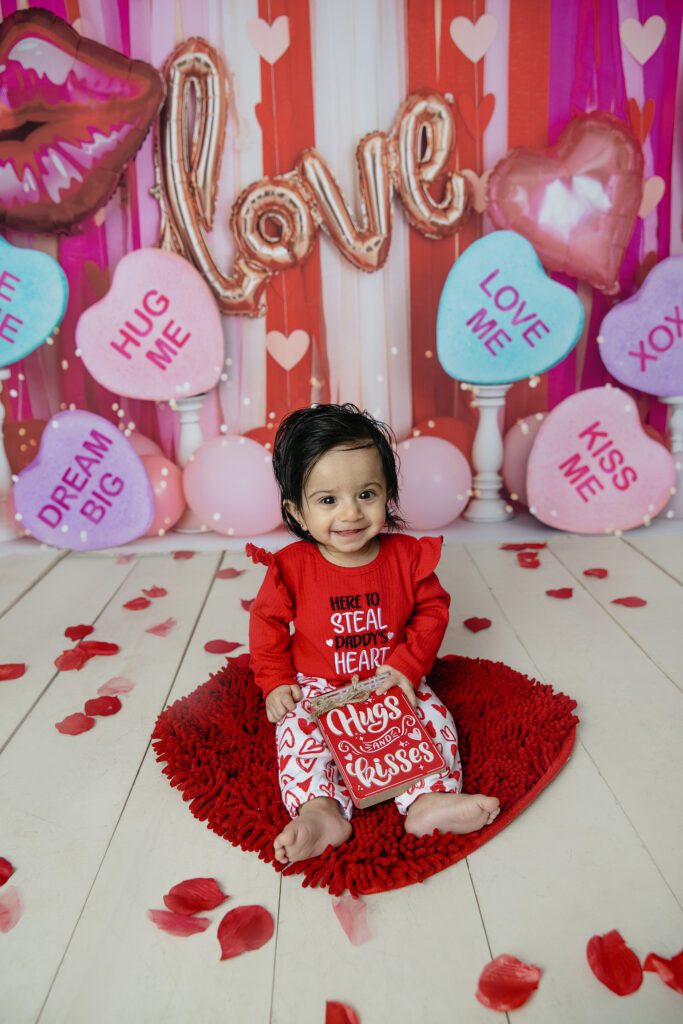 Baby girl shows love for her Daddy for a Valentine's Day mini session at Just Peachy Photography in Palatine, IL